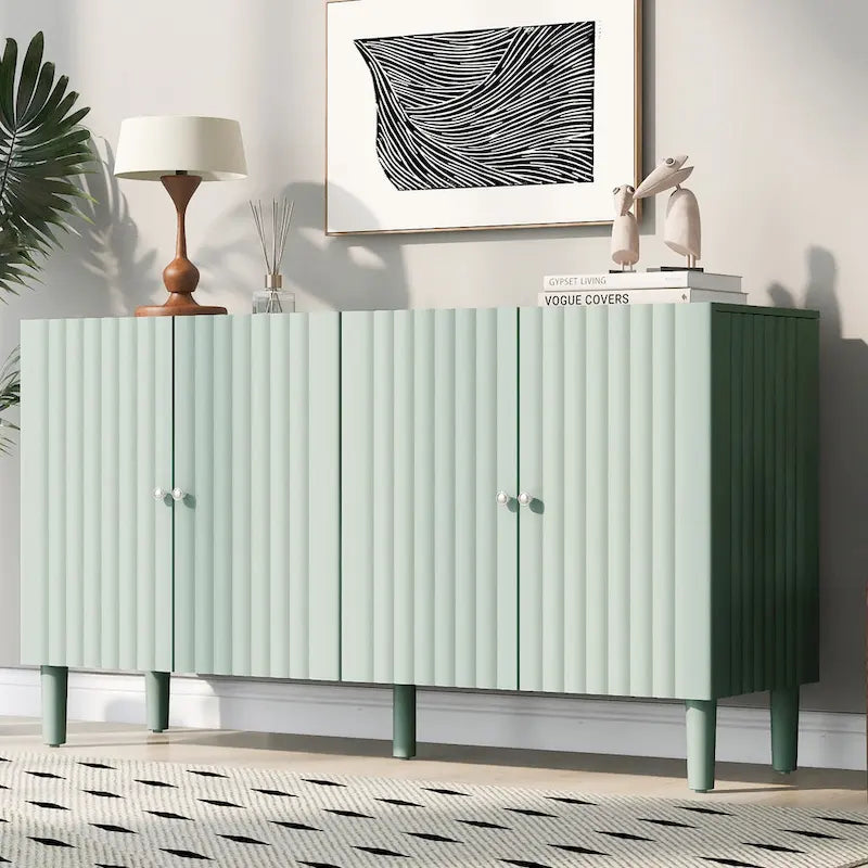 Elegante aparador de cuatro puertas con puertas de diseño ondulado, patas cilíndricas y elegantes tiradores metálicos, ajustable, para sala de estar